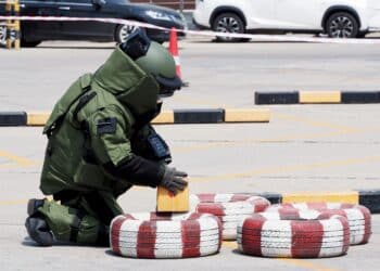 Bomb Disposal Expert in Bomb suit for Explosive ordnance disposal