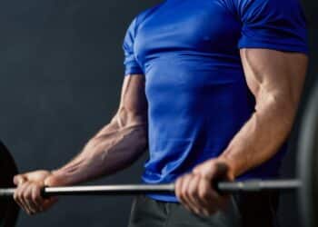 Muscles man workout in gym. Man Fitness Motivation, Caucasian men's workout for strengthen muscles do the list Workout Routines Training Programs. Man exercise Beginner gym workout for strength.