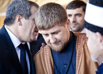 AMMAN, JORDAN - MAR 15: Vice president Ziad Sabsab translates to Chechen president Ramzan Kadyrov after accepting gift during visit to Jordan. March 15, 2011 in Amman, Jordan.