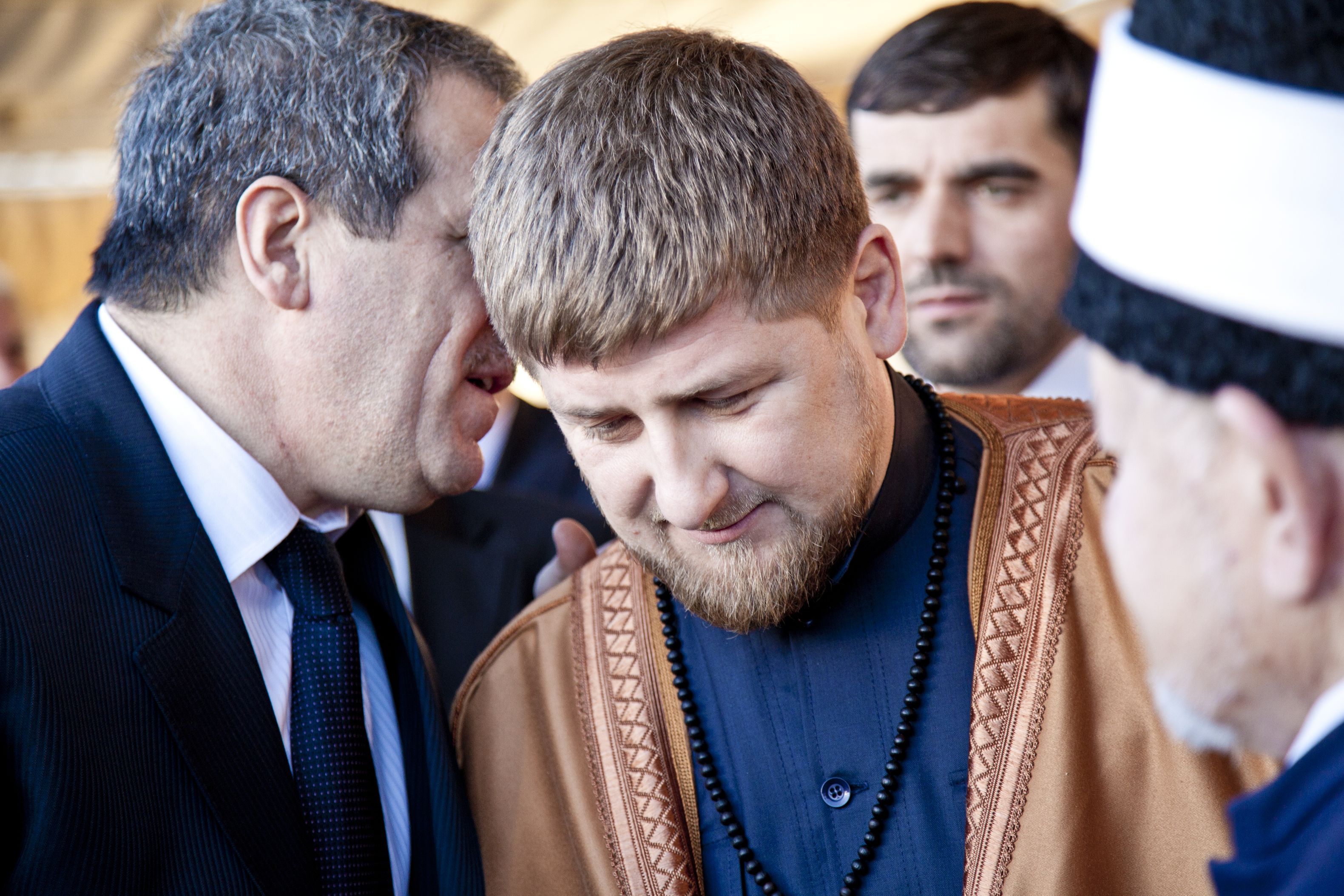 AMMAN, JORDAN - MAR 15: Vice president Ziad Sabsab translates to Chechen president Ramzan Kadyrov after accepting gift during visit to Jordan. March 15, 2011 in Amman, Jordan.