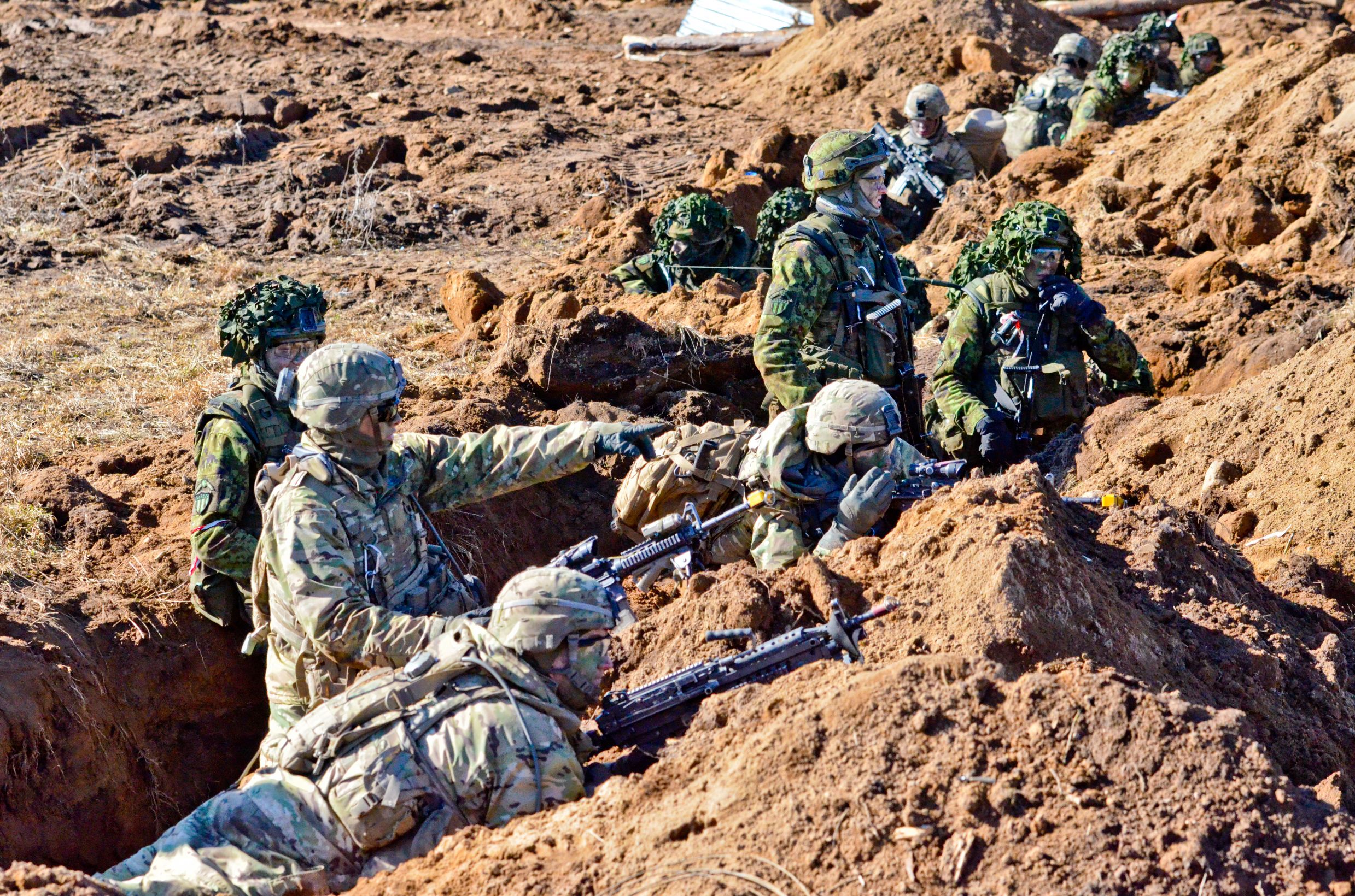 Soldiers from Company C, 1st Battalion, 68th Armored Regiment, 3rd Armored Brigade Combat Team, 4th Infantry Division, conduct Operation Golden Shovel with Estonian Defence Forces on Kukepalu range as a part of Operation Atlantic Resolve, March 23.