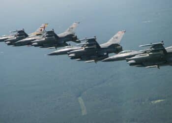 A Four-Ship formation of F-16 Fighting Falcons fly over Shaw Air Force Base, S.C., 21 July, 2017, as part of a commemoration of the hundredth anniversary of the 55th Fighter Squadrons activation. The formation consisted of the wing flagship aircraft from the 55th, 77th, and 79th fighter squadrons all stationed at Shaw AFB. (U.S. Air Force Photo by Tech. Sgt. Gregory Brook)