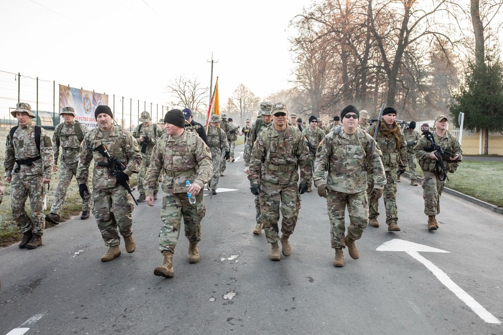 Members of the 278th Armored Cavalry Regiment from Tennessee participate in Veterans Day Ruck March at the International Peacekeeping ands Security Center, Ukraine, Nov. 11.