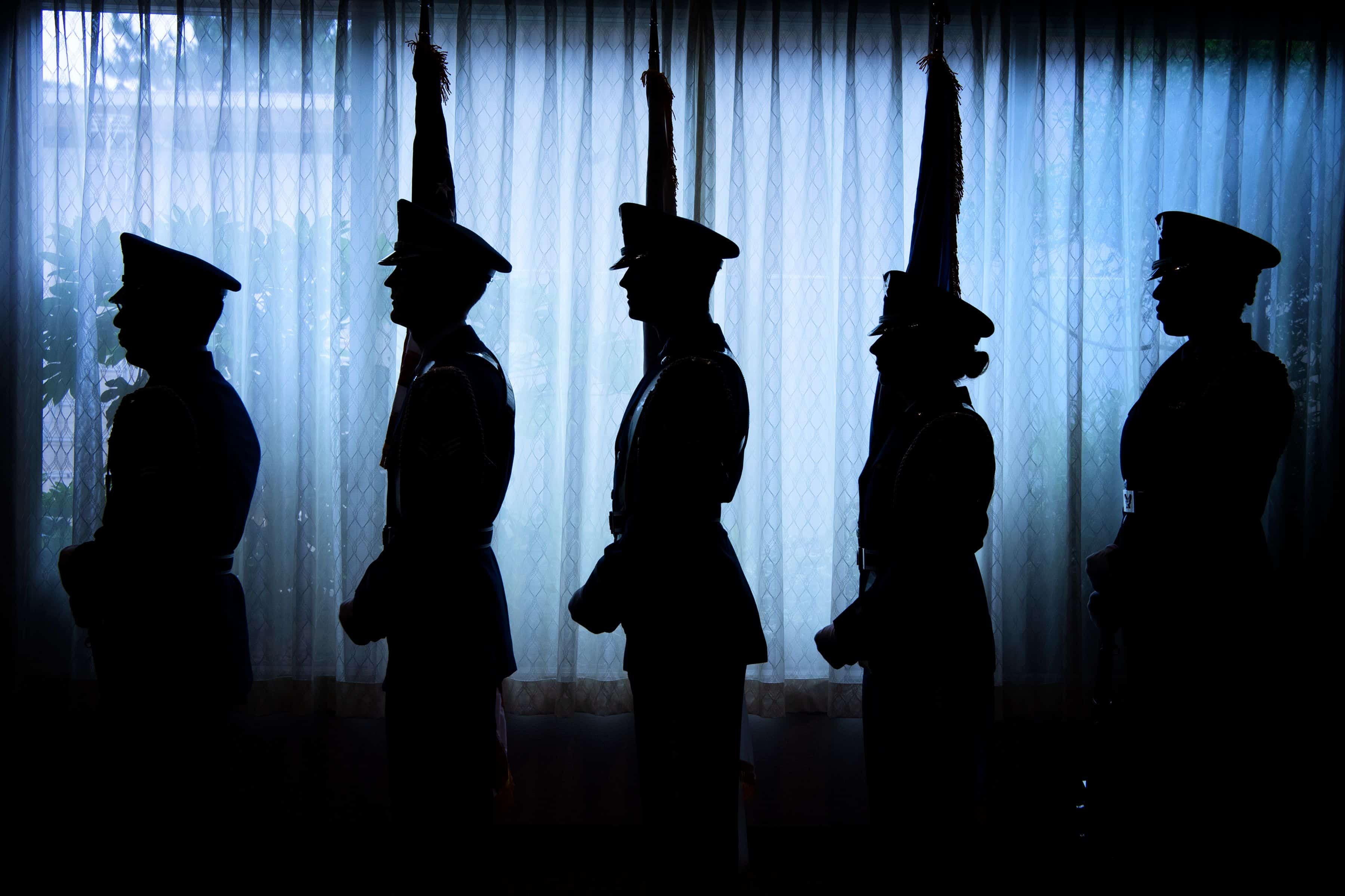 The Yokota Air Base Honor Guard stands by to present the colors during a promotion ceremony at Yokota Air Base, Japan, June 27, 2019. Their mission is to provide professional military honors for all official military and civil ceremonies as required by the wing, and higher headquarters. (U.S. Air Force photo by Yasuo Osakabe)