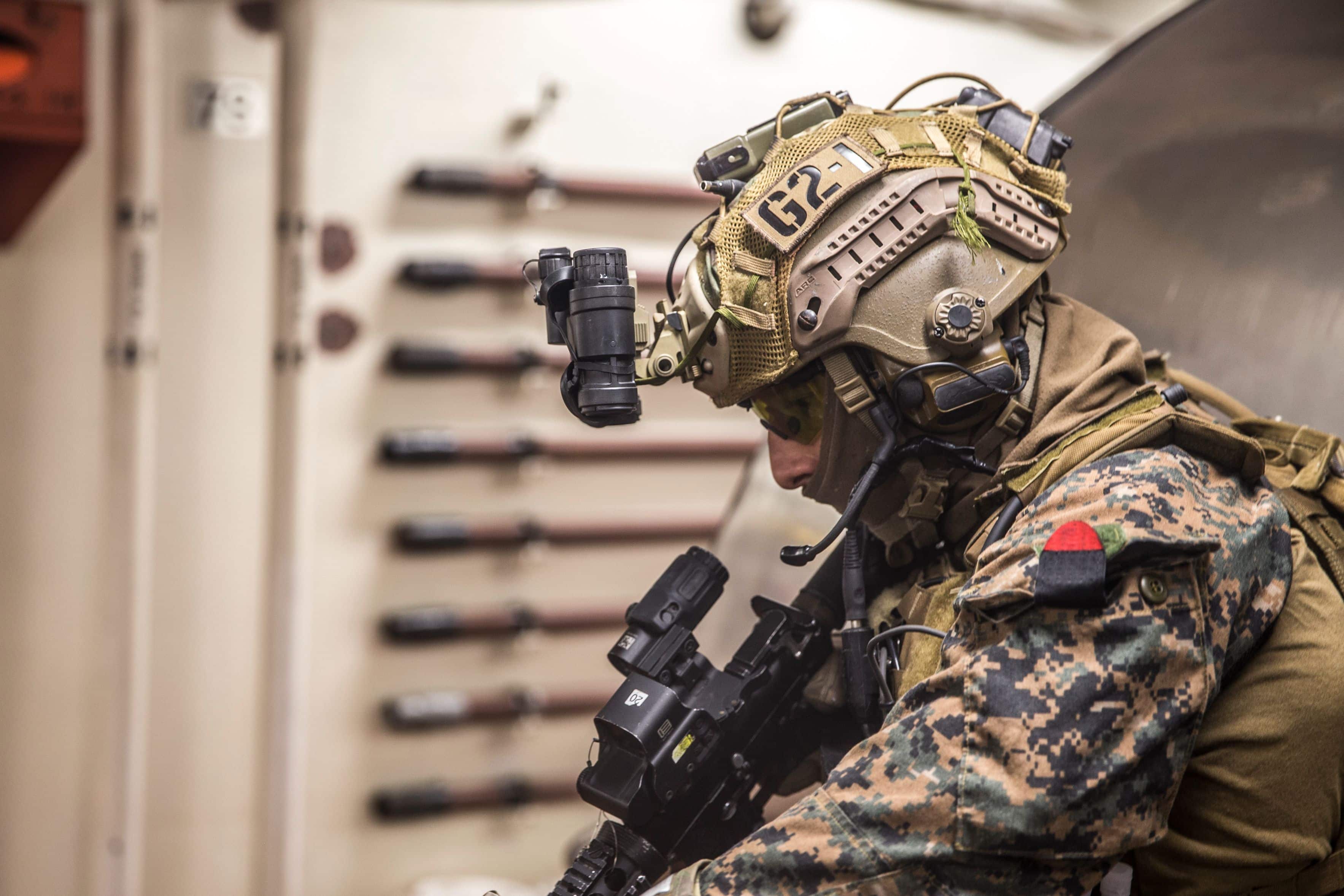 A U.S. Marine with the Maritime Raid Force, 26th Marine Expeditionary Unit (MEU), provides security as part of a Visit, Board, Search and Seizure (VBSS) mission during Amphibious Ready Group (ARG), MEU exercise (ARGMEUEX) in the vicinity of Camp Lejeune, North Carolina, Aug. 27, 2019. VBSS is part of the Maritime Interception Operations that aim to delay, disrupt, or destroy enemy forces or supplies in the Maritime domain. (U.S. Marine Corps photo by Cpl. Tanner Seims)