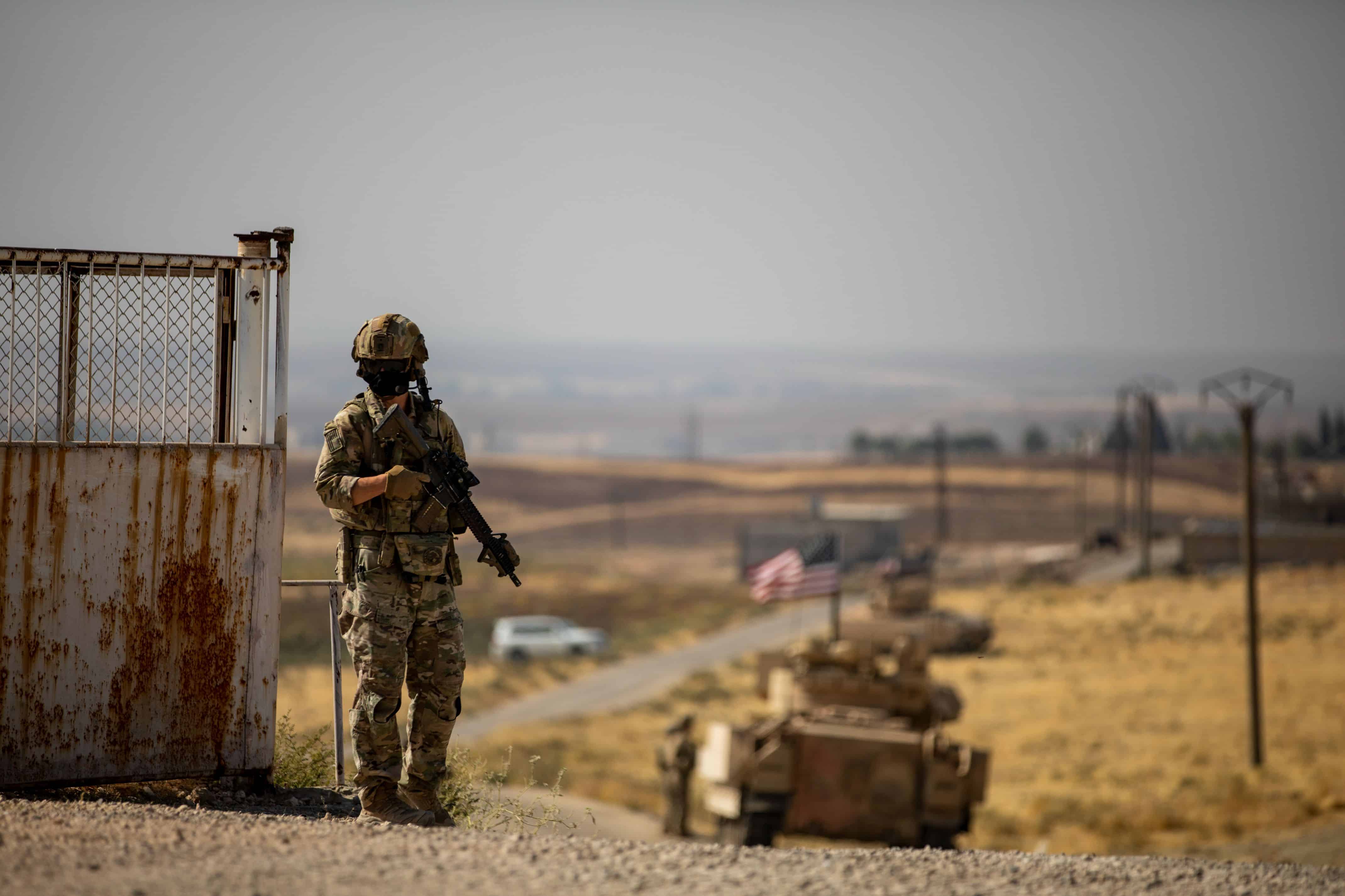 Sgt. Christian Cameron, from 1st Squadron, 73rd Cavalry Regiment, 2nd Brigade Combat Team, 82nd Airborne Division, pulls security for his team in Central Command (CENTCOM) area of responsibility, Oct. 27, 2020. The soldiers are in Syria to support Combined Joint Task Force-Operation Inherent Resolve (CJTF-OIR) mission. CJTF remains committed to working by, with and through our partners to ensure the enduring defeat of Daesh. (U.S. Army photo by Spc. Jensen Guillory)