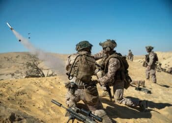 211104-M-PO838-1233 BISLAH, Israel (Nov. 4, 2021) Marines Cops Sgt. Brett Meil, center right, a squad leader assigned to Alpha Company, Battalion Landing Team 1/1, 11th Marine Expeditionary Unit (MEU), launches a star cluster to signal platoon members during a live-fire and maneuver range in support of an Israel interoperability exercise at Bislah Training Center, Israel, Nov. 4.