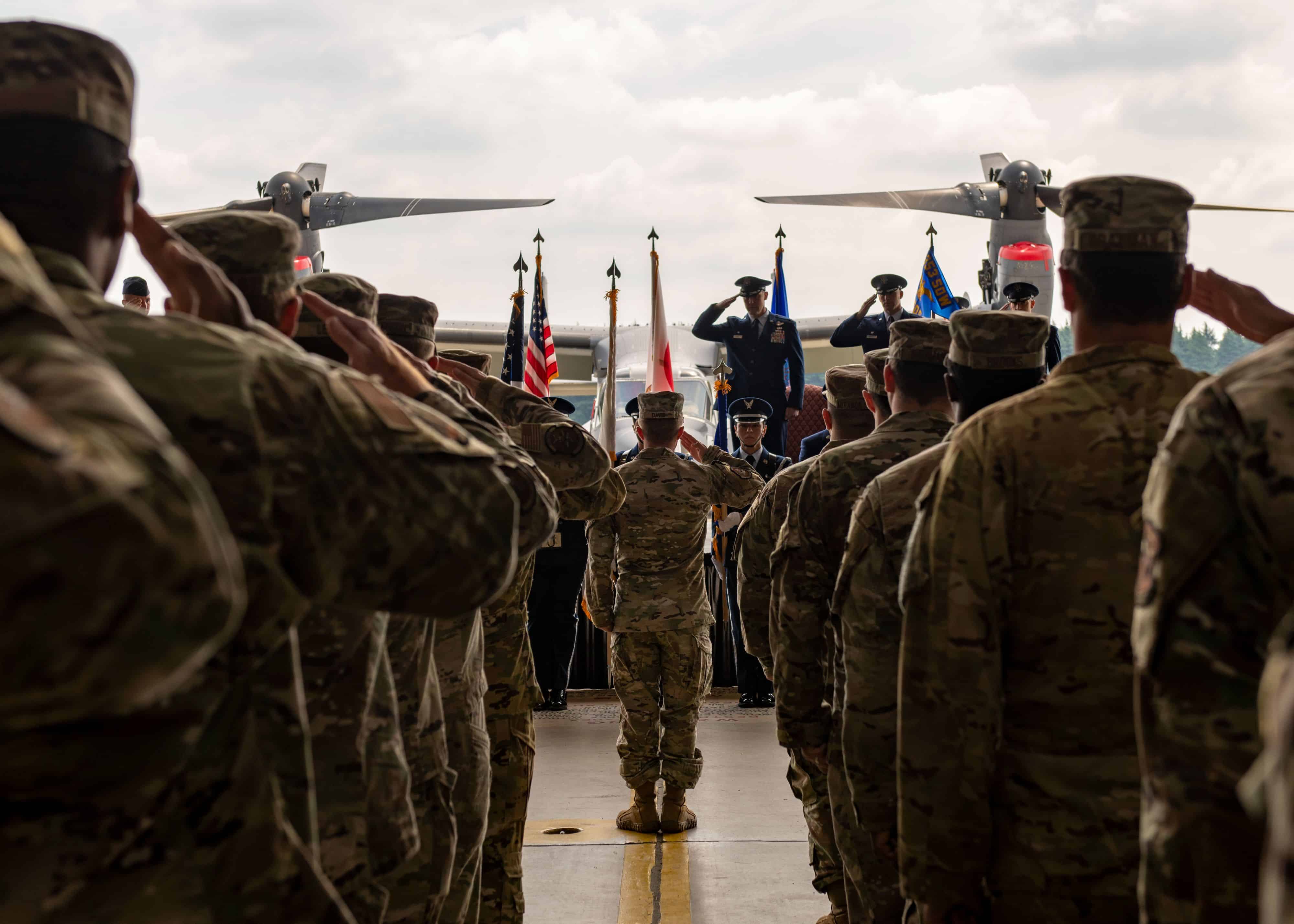 Col. Shane Vesely, 353rd Special Operations Wing commander, salutes the Airmen of the 21st Special Operations Squadron during a change of command ceremony for the 21st SOS at Yokota Air Base, Japan, June 3, 2022. Per military doctrine, the primary purpose of a change of command ceremony is to allow subordinates to witness the formal leadership changeover of one officer to another. (U.S. Air Force Photo by Staff Sgt. Ryan Lackey)