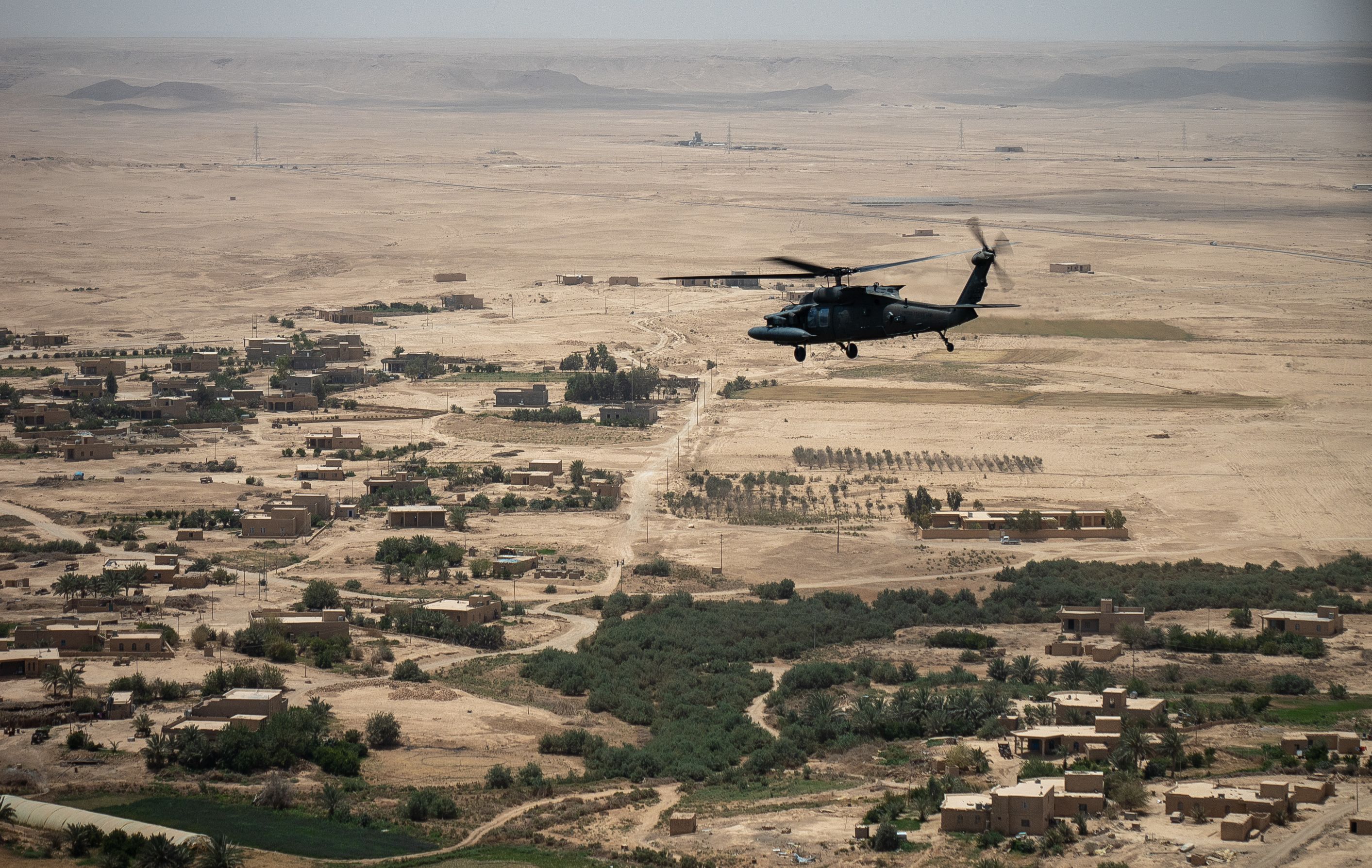 A UH-60 Black Hawk with 7th General Support Aviation Battalion, 158th Aviation Regiment, 11th Combat Aviation Brigade (CAB) flies during a mission in the U.S. Central Command area of operations, June 6, 2022. 11th CAB, mobilized as Task Force Eagle, is deployed in support of the Combined Joint Task Force
