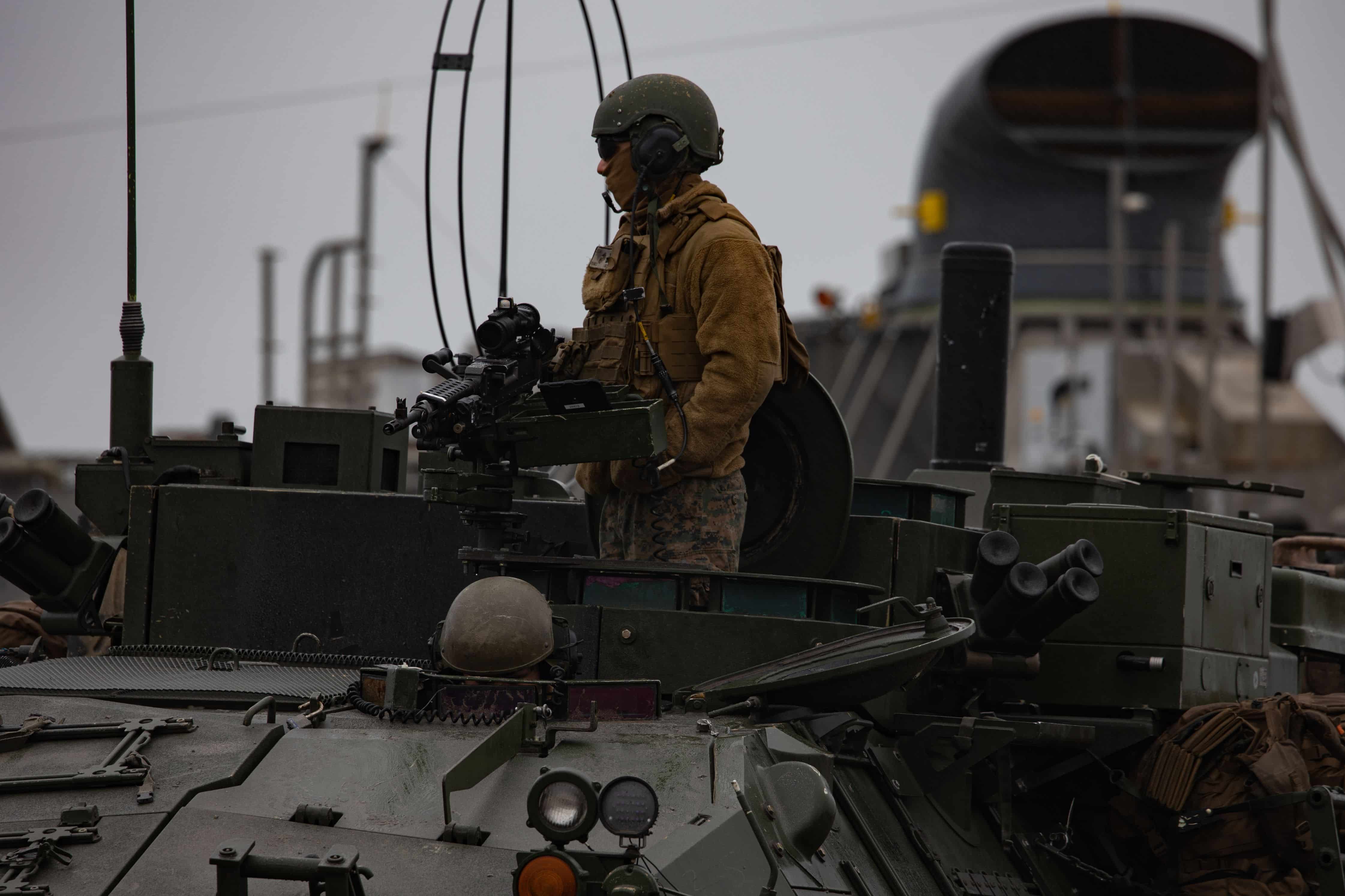 U.S. Marine Corps Light Armored Vehicles assigned to the Battalion Landing Team 1/6, 26th Marine Expeditionary Unit (MEU), are offloaded and staged during a raid part of MEUEX II on Marine Corps Base Camp Lejeune, North Carolina, Feb. 2, 2023. The raid was the culminating event for MEUEX II, following Amphibious Squadron/Marine Expeditionary Unit Integration Training (PMINT).