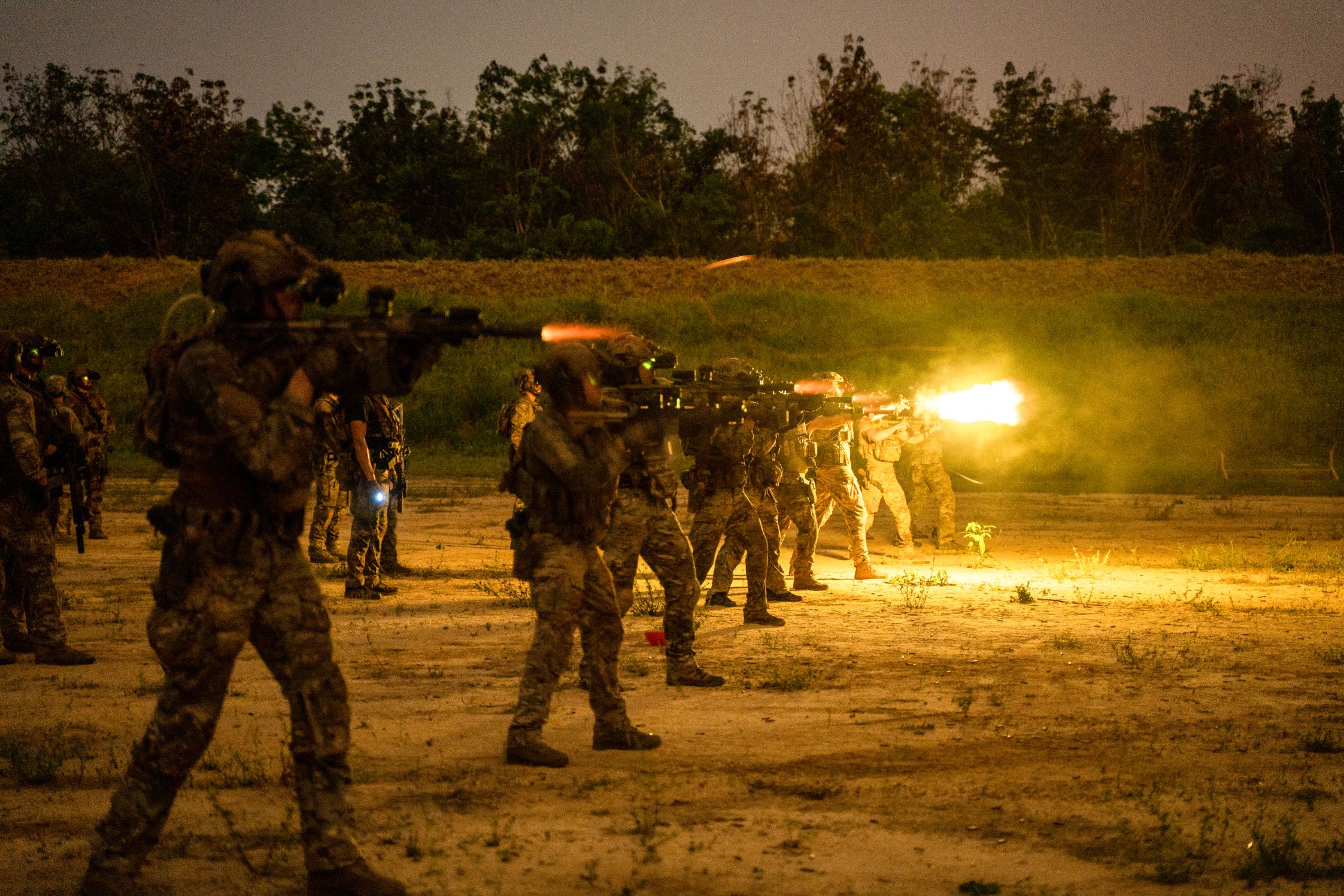 Special Forces Soldiers from Canada, Netherlands, France and the U.S. take part in night shooting at a 400m training range during Flintlock near Abidjan, Côte d'Ivoire, March 4, 2023. Flintlock is U.S. Africa Command’s premier and largest annual special operations exercise that strengthens key partner nations throughout Africa, in partnership with other international special operations forces. (U.S. Air Force photo by Tech. Sgt. Katelynn Moeller)