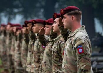 U.S. Army Soldiers, 82nd Airborne Division artillery, salute during the national anthem at the re-designation ceremony, June 2, 2023, at Fort Liberty, N.C.. Fort Liberty's top priority is honoring the people who served, and unites all of what former Fort Bragg stands for. (U.S. Army photo by Spc. Osvaldo Fuentes)