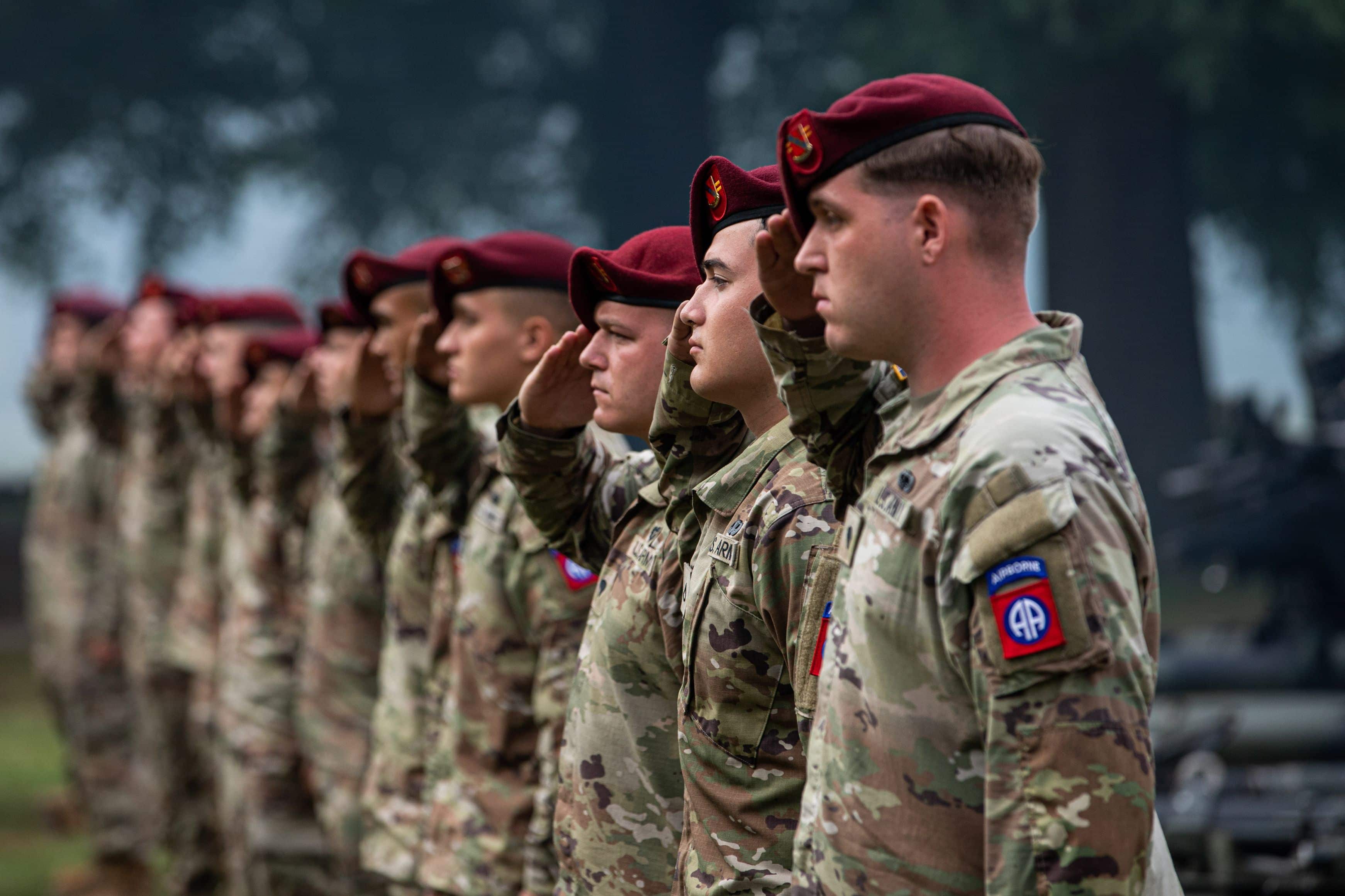 U.S. Army Soldiers, 82nd Airborne Division artillery, salute during the national anthem at the re-designation ceremony, June 2, 2023, at Fort Liberty, N.C.. Fort Liberty's top priority is honoring the people who served, and unites all of what former Fort Bragg stands for. (U.S. Army photo by Spc. Osvaldo Fuentes)