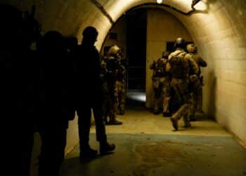 Green Berets with Critical Threats Advisory Company (CTAC), 2nd Battalion, 10th Special Forces Group (Airborne), maneuver down a hallway interlocking sectors of fire near Konjic, Bosnia-Herzegovina, May 8, 2023. U.S.