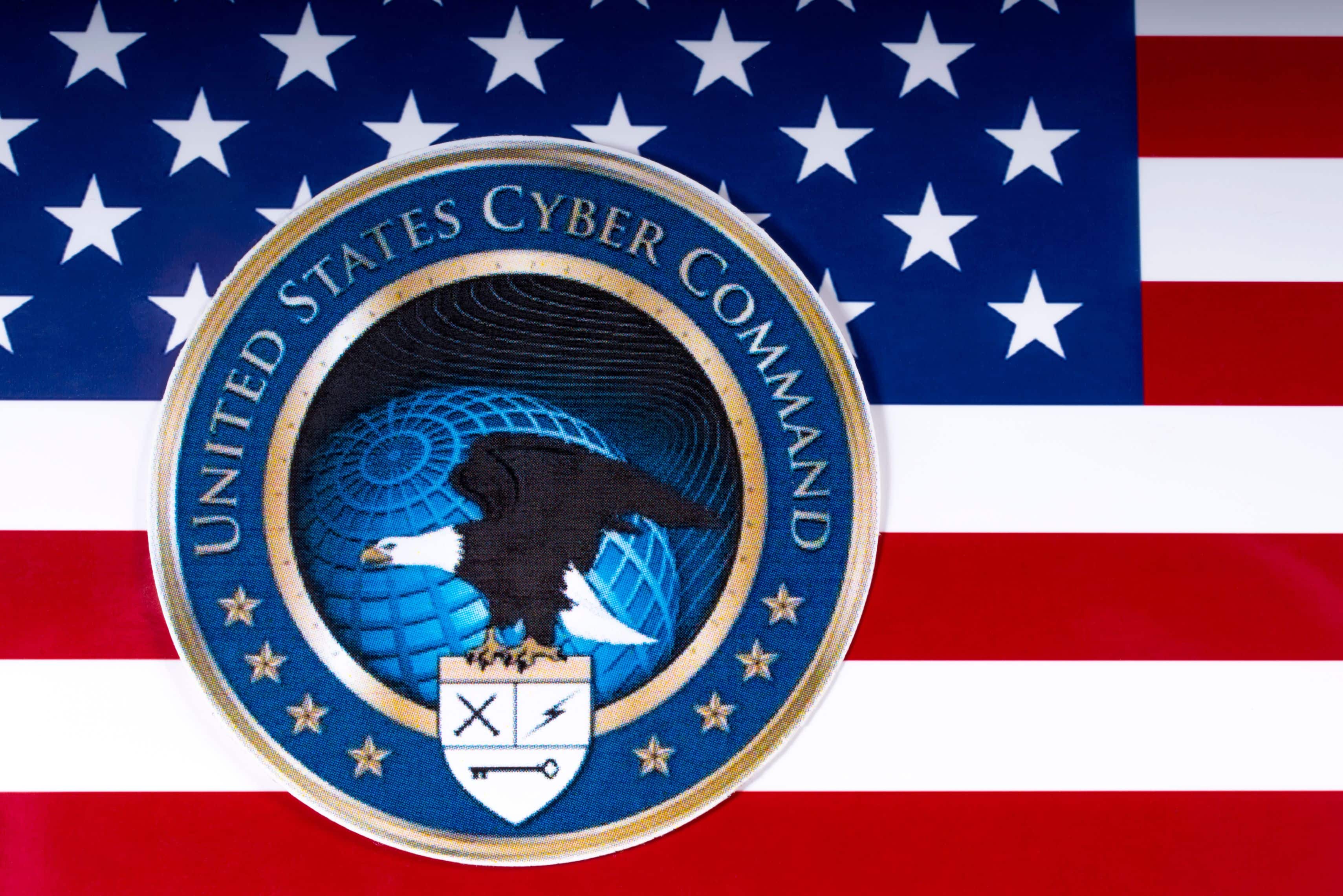 LONDON, UK - MARCH 26TH 2018: The symbol of the United States Cyber Command portrayed with the US flag, on 26th March 2018.
