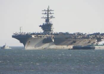 Lisbon / Portugal - June 22, 2013: USS Dwight D. Eisenhower (CVN-69) (known informally as "Ike") anchored on the entrance of the Tagus river estuary, Lisbon, Portugal.