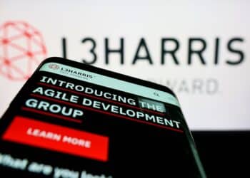 Stuttgart, Germany - 06-18-2022: Mobile phone with website of US aerospace company L3Harris Technologies Inc. on screen in front of logo. Focus on top-left of phone display. Unmodified photo.