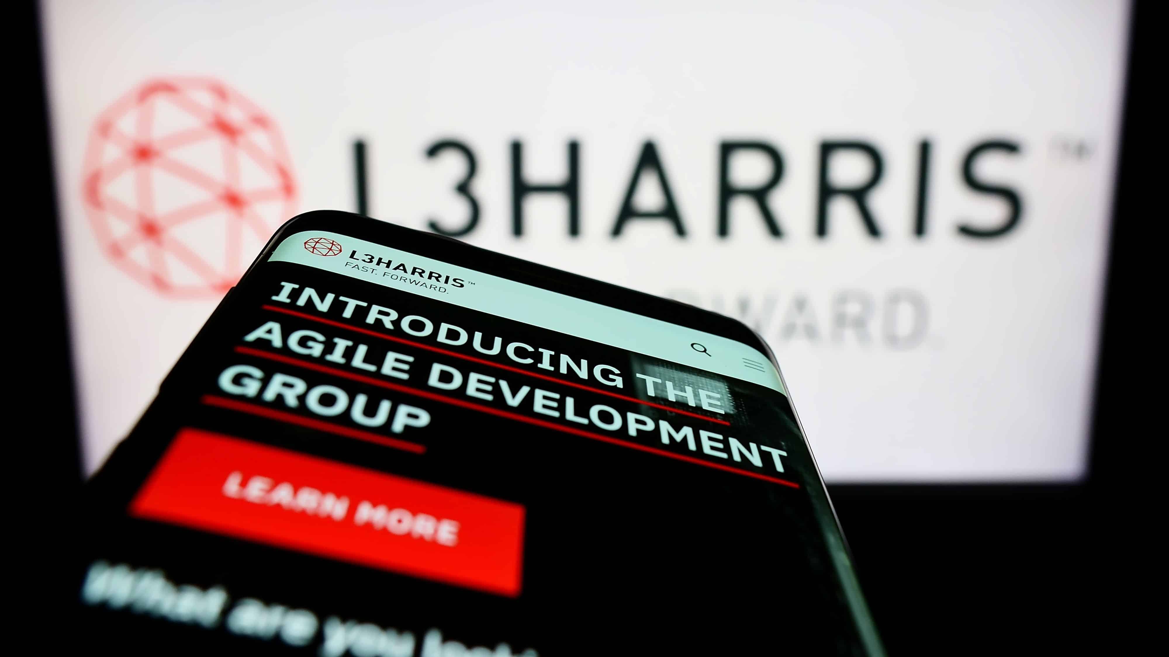 Stuttgart, Germany - 06-18-2022: Mobile phone with website of US aerospace company L3Harris Technologies Inc. on screen in front of logo. Focus on top-left of phone display. Unmodified photo.