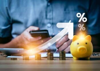 Interest rate and dividend concept, Businessman is calculating income and return on investment in percentage. income, return, retirement, compensation fund, investment, dividend tax, stock market