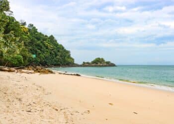 Beautiful sandy beach in uninhabited island. Perfect landscape background for relaxing vacation