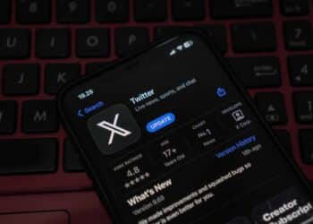 Yogyakarta, Indonesia - July 29, 2023: The latest Twitter application update on ios and android that replaces the old white bird logo on a blue background with a new white X on a black background.
