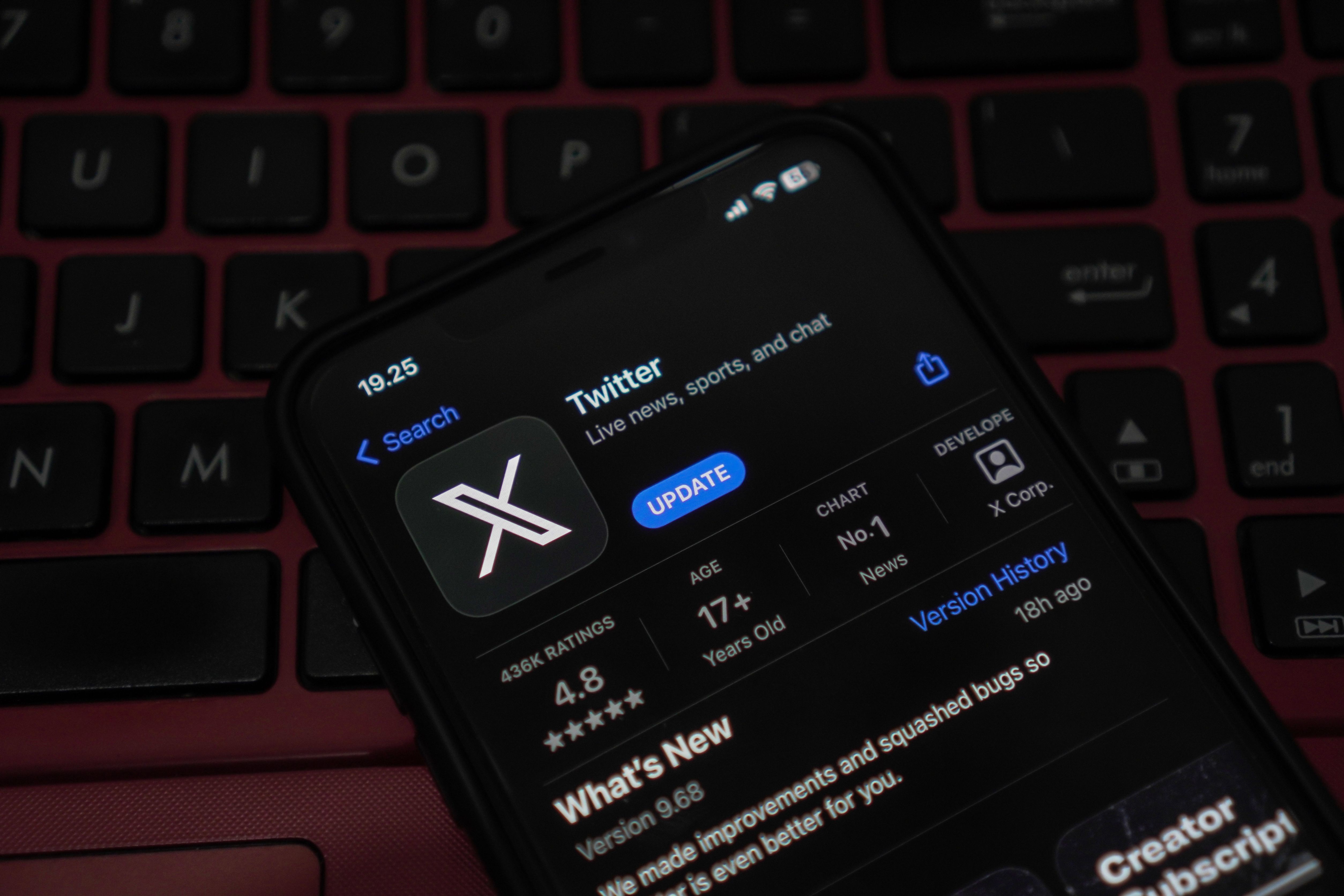 Yogyakarta, Indonesia - July 29, 2023: The latest Twitter application update on ios and android that replaces the old white bird logo on a blue background with a new white X on a black background.