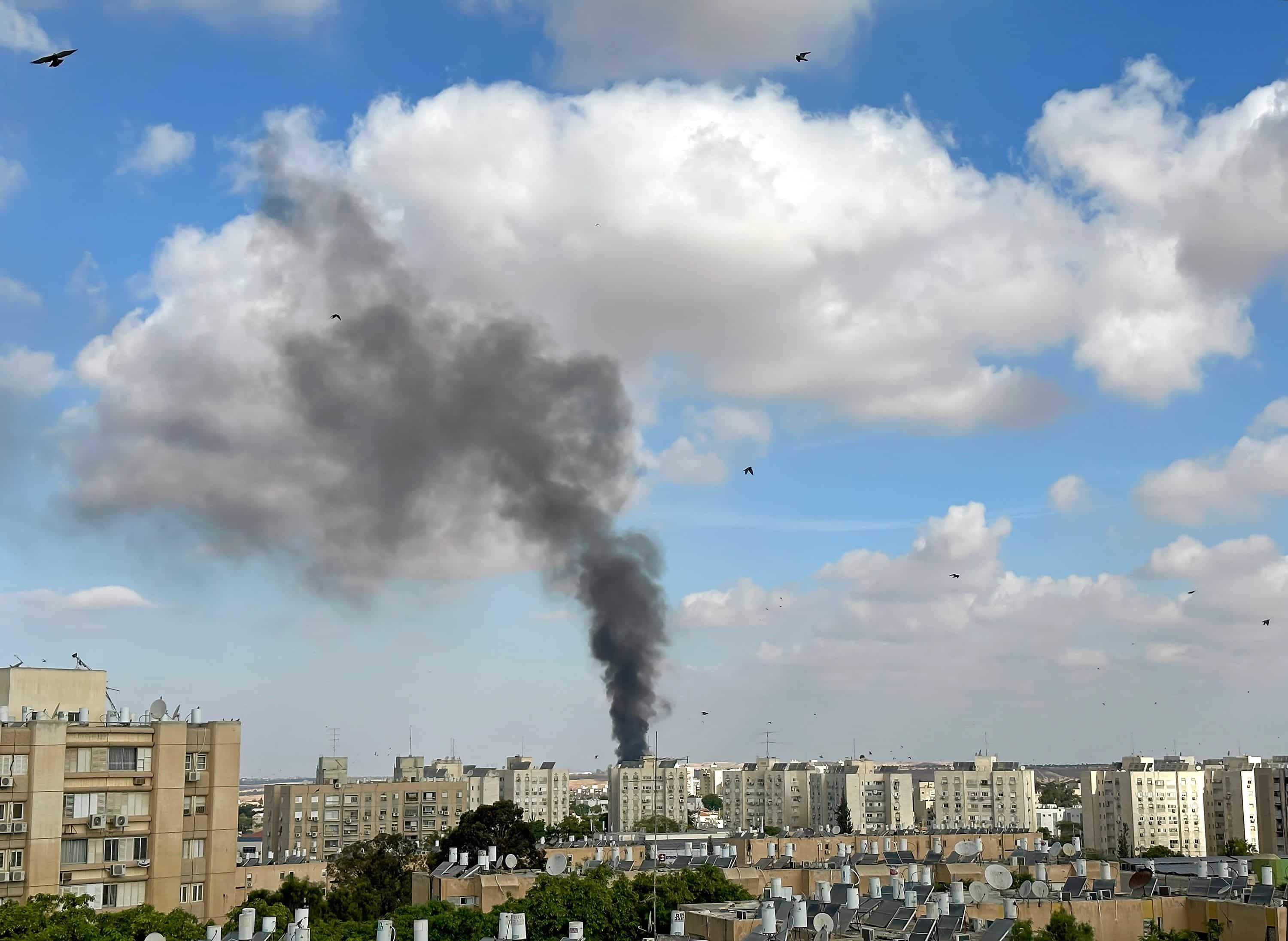 BEER SHEVA, ISRAEL - OCTOBER 07, 2023: A column of smoke at the site of a fallen Hamas rocket from the Gaza Strip