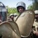 Nairobi, Kenya - February 13, 2014: Color picture of a policemen holding shields