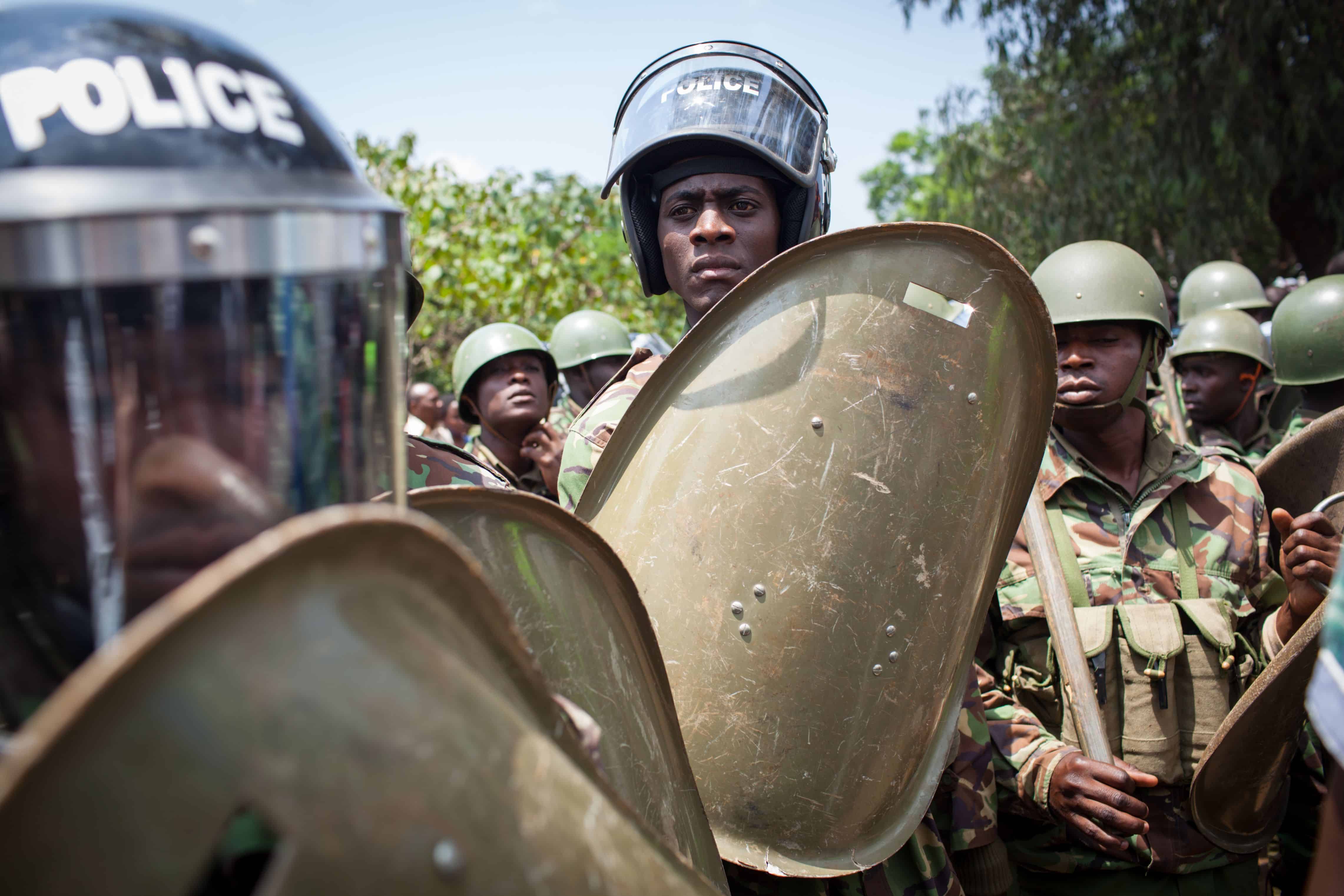 Nairobi, Kenya - February 13, 2014: Color picture of a policemen holding shields