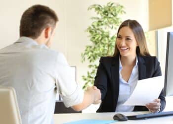 Successful job interview with boss and employee handshaking