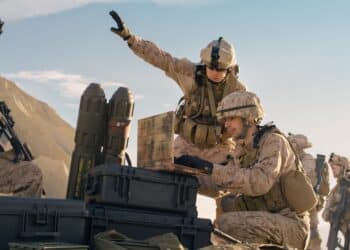 Soldiers are Using Laptop Computer for Surveillance During Military Operation in the Desert.