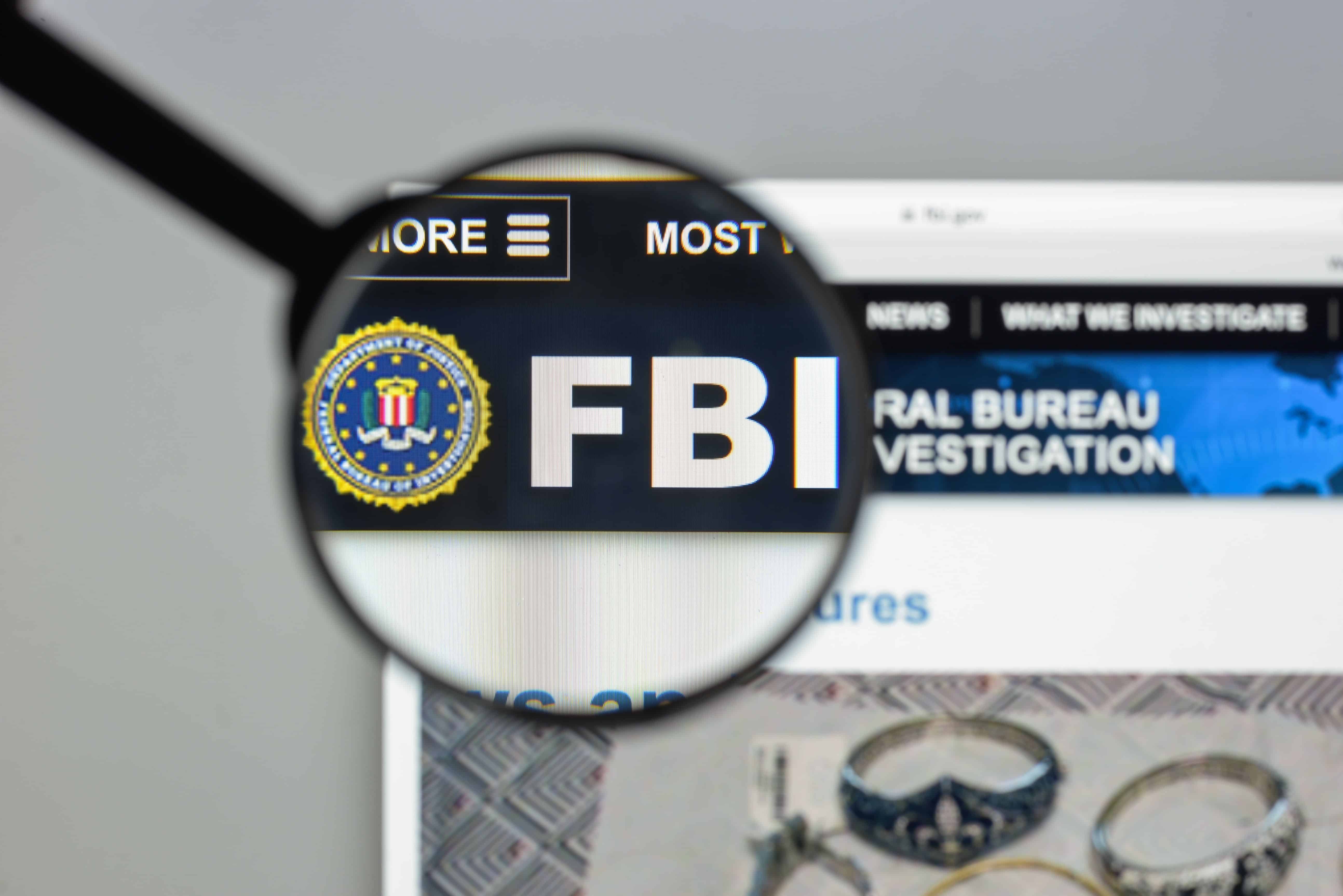 Milan, Italy - August 10, 2017: Fbi website homepage. It is the domestic intelligence and security service of the United States, and its principal federal law agency. FBI logo visible.
