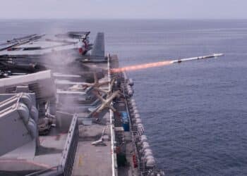 A rolling airframe missile (RAM), a surface-to-air intercept missile, launches from amphibious assault ship USS America (LHA 6), during a live-fire missile exercise off the coast of California.