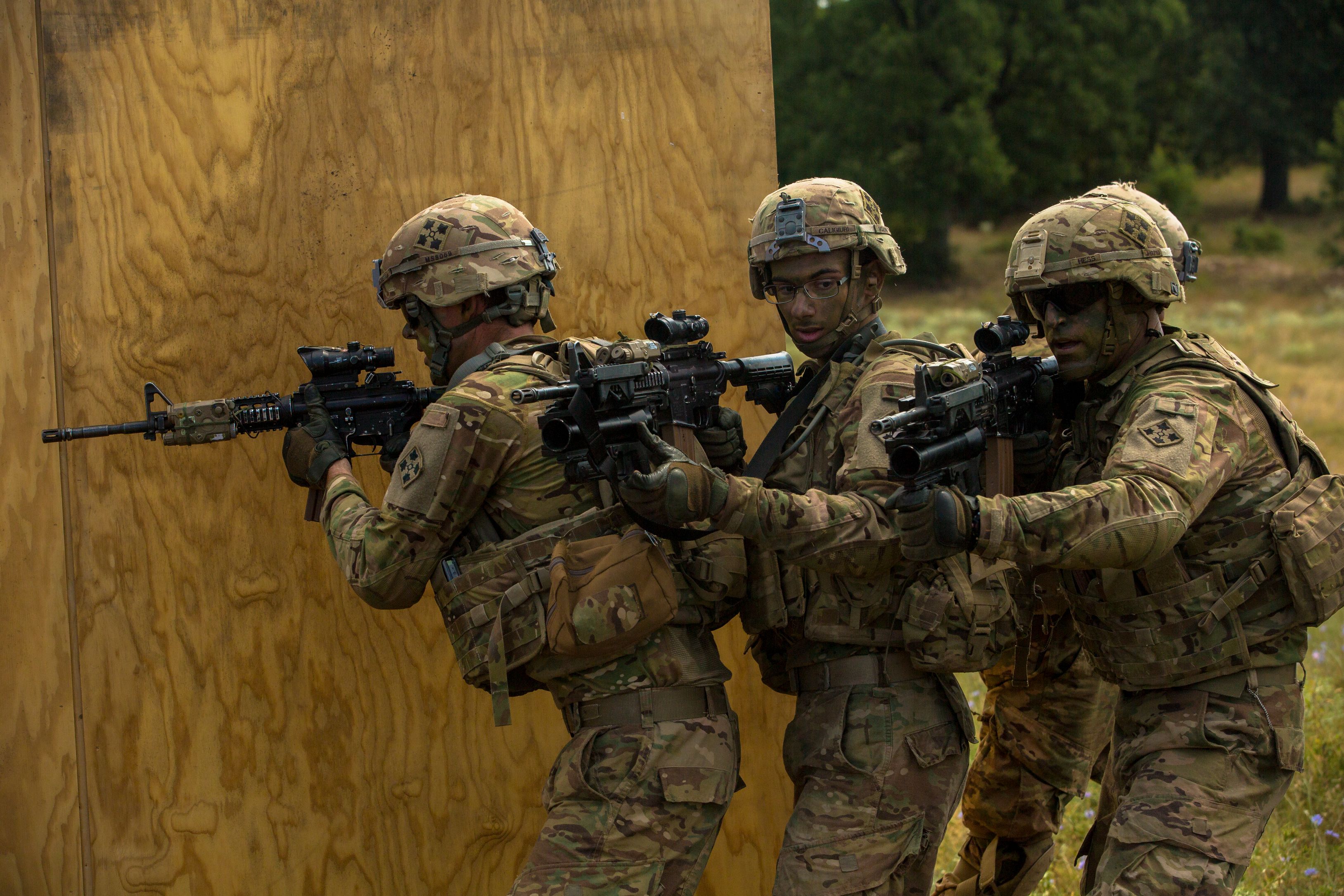 U.S. Army soldier with 1st battalion, 8th infantry regiment, 3rd armored brigade combat team, 4th infantry division prepare to breach a room during urban operations training for the 2017 Saber Guardian Exercise at Koren, Bulgaria, July 15, 2017.