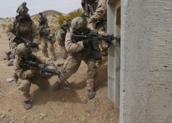U.S. Army Soldiers assigned to 5th Battalion, 20th Infantry Regiment, 1st Brigade Combat Team, 2nd Infantry Division, fire into an enemy tunnel complex during Decisive Action Rotation 18-06 at the National Training Center in Fort Irwin, Calif., April 15, 2018. Decisive Action Rotations at the National Training Center ensure units remain versatile, responsive, and consistently available for current and future contingencies. (U.S. Army photo by Spc. Daniel Parrott, Operations Group, National Training Center)