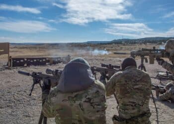 U.S. Army Operators assigned to 10th Special Forces Group (Airborne) perform barrier hole and tripod training on Fort Carson, Colorado, Dec. 6, 2018. Firing through barrier holes simulates firing through walls to engage long distance targets. (U.S. Army photo by Spc. Jacob Krone)