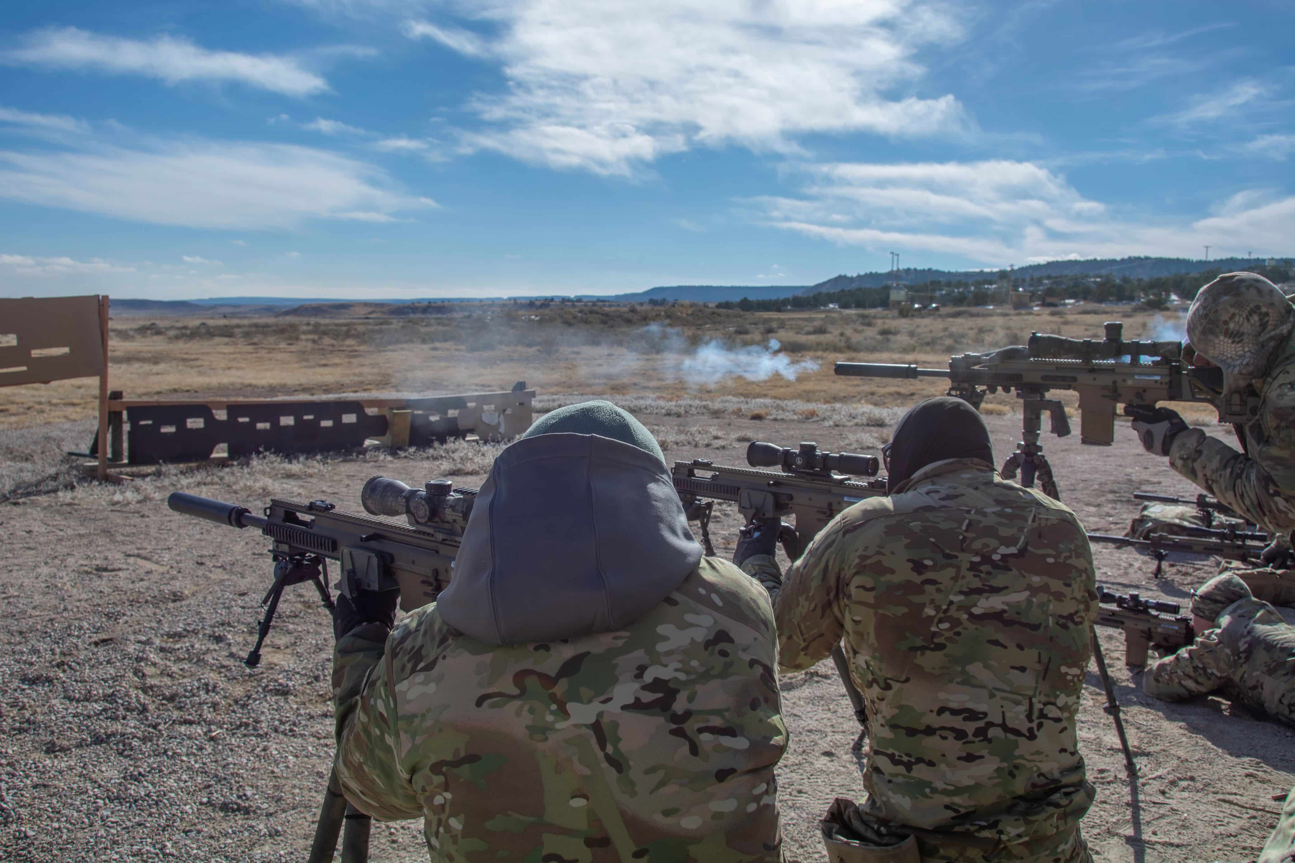U.S. Army Operators assigned to 10th Special Forces Group (Airborne) perform barrier hole and tripod training on Fort Carson, Colorado, Dec. 6, 2018. Firing through barrier holes simulates firing through walls to engage long distance targets. (U.S. Army photo by Spc. Jacob Krone)