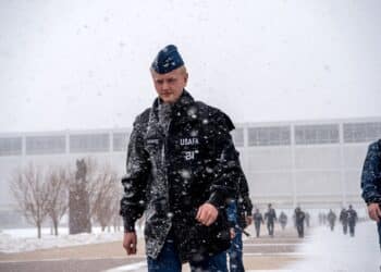 U.S. AIR FORCE ACADEMY, Colo. – Cadets cross the Terrazzo braving winter weather caused by a sudden snow squall on Feb. 24, 2020 at the U.S. Air Force Academy. (U.S. Air Force photo/Trevor Cokley)