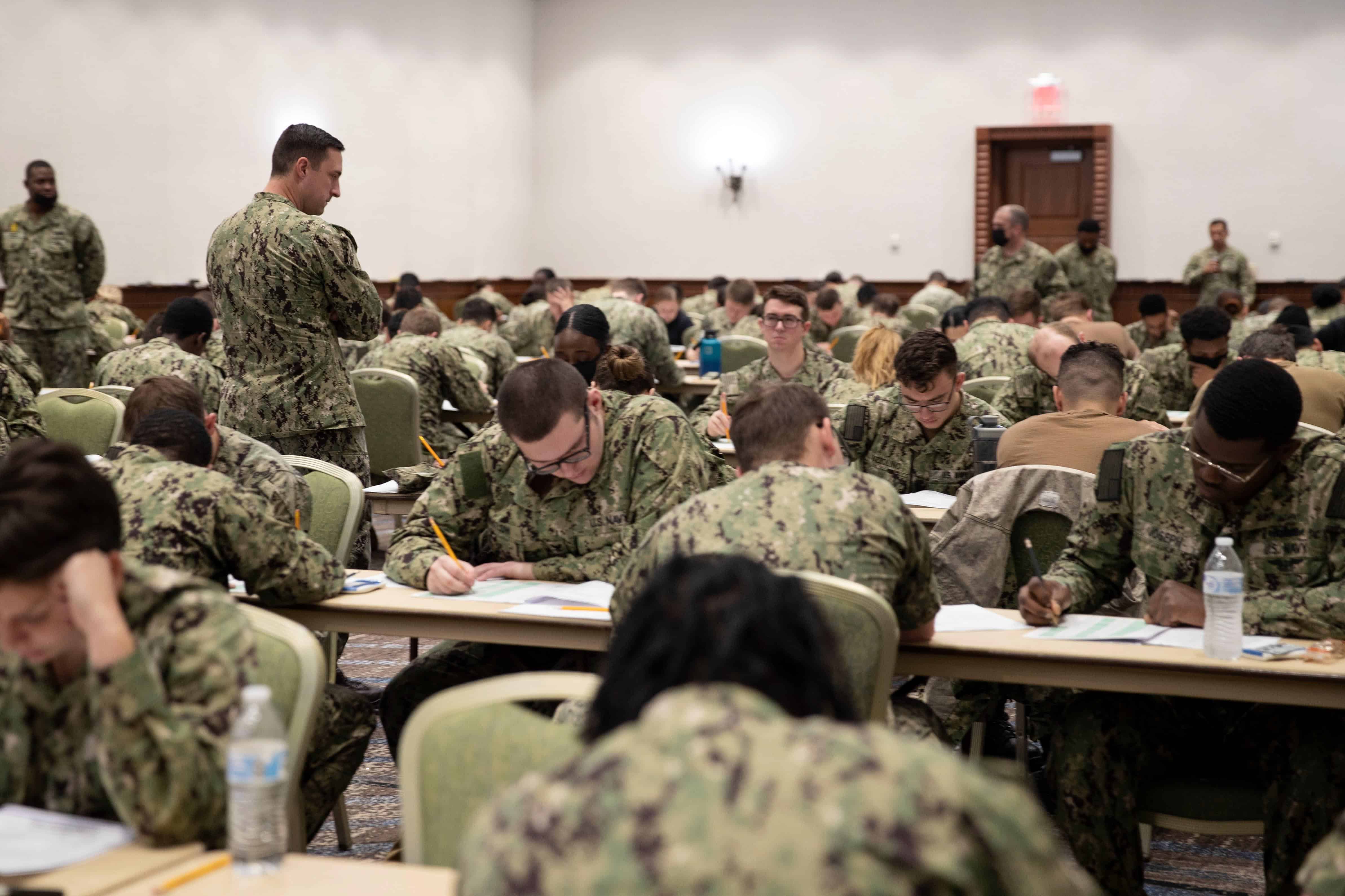 Chief Air Traffic Controller Joshua McClellan, from Fort Collins, Colorado, assigned to USS Gerald R. Ford’s (CVN 78) operations department, proctors the E5 Navy Wide Advancement Exam at the Newport News Marriott at City Center, Sept. 30, 2021. Ford is in port Newport News Shipyard executing her Planned Incremental Availability (PIA), a six-month period of modernization, maintenance and repairs. (U.S. Navy photo by Mass Communication Specialist 1st Class Julie R. Matyascik)