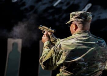 U.S. Air Force Col. Raymond A. Sackman, 177th Fighter Wing inspector general (detail), fires a SIG Sauer P320-M18 handgun Sep. 24, 2021, at the FAA William J. Hughes Technical Center, Egg Harbor Township, N.J. Members of the 177th FW went to the range to qualify for the M18 and gain the perspective of the Airmen who will carry it. (U.S. Air National Guard photo by Senior Airman Hunter Hires)