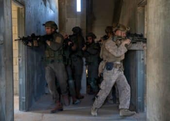 211108-M-PO838-1361 MALA NATIONAL TRAINING CENTER, Israel (Nov. 8, 2021) Marines assigned to Alpha Company, Battalion Landing Team 1/1, 11th Marine Expeditionary Unit, and Israel Defense Forces Soldiers conduct room clearing techniques during close quarters battle training in support of Israel interoperability exercise at Mala National Training Center, Nov. 8.