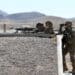 An M240 machine gun team from the 268th Military Police Company, of the Tennessee National Guard fires at targets, while observed by observer coach/trainers assigned to the 3-360th Training Support Battalion, during a range training exercise at Fort Bliss, Texas. The training focused primarily on communications between the tower,