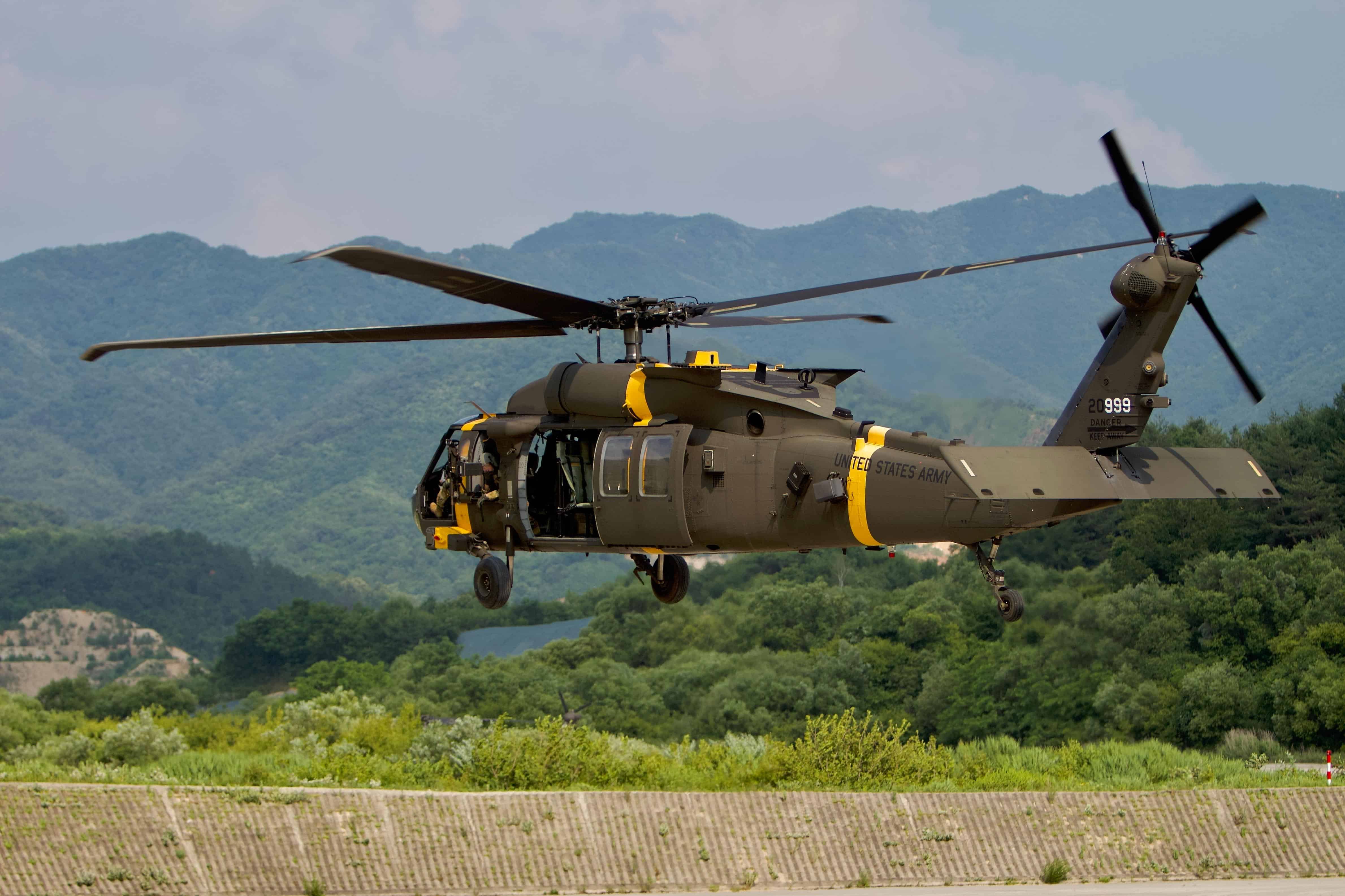 U.S. Army Soldiers from 2nd Battalion, 2nd Aviation Regiment, 2nd Combat Aviation Brigade, 2nd Infantry Division/ROK-U.S. Combined Division participate in dual door gunnery in their semi-annual door gunnery training exercise from June 21 to 25, 2022. A UH-60M Black Hawk helicopter takes off after refueling to continue day time table VI aerial gunnery.