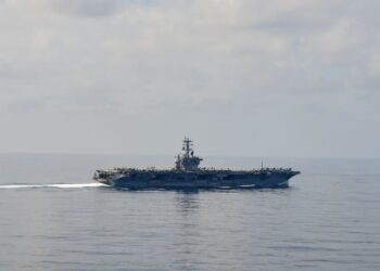 230115-N-BI507-1181 SOUTH CHINA SEA (Jan. 15, 2022) The aircraft carrier USS Nimitz (CVN 68) steams through the South China Sea. Nimitz in U.S. 7th Fleet conducting routine operations. 7th Fleet is the U.S. Navy's largest forward-deployed numbered fleet, and routinely interacts and operates with Allies and partners in preserving a free and open Indo-Pacific region. (U.S. Navy photo by Mass Communication Specialist 3rd Class Carson Croom)