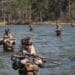 U.S. Marines with Charlie Company, Battalion Landing Team (BLT) 1/6, 26th Marine Expeditionary Unit (MEU) conduct boat patrols during a littoral movement as part of MEU Exercise III on Camp Lejeune, North Carolina, March 11, 2023. BLT 1/6 continues to enhance RHIB familiarization and readiness through conducting on and off and shore-to-shore drills prior to deployment. The 11m RHIBs provide the Marine Air-Ground Task Force Commander a high-speed, long –range, low-signature combatant craft capable of projecting and recovering Marines for a variety of missions. (U.S. Marine Corps photo by Cpl. Aziza Kamuhanda)