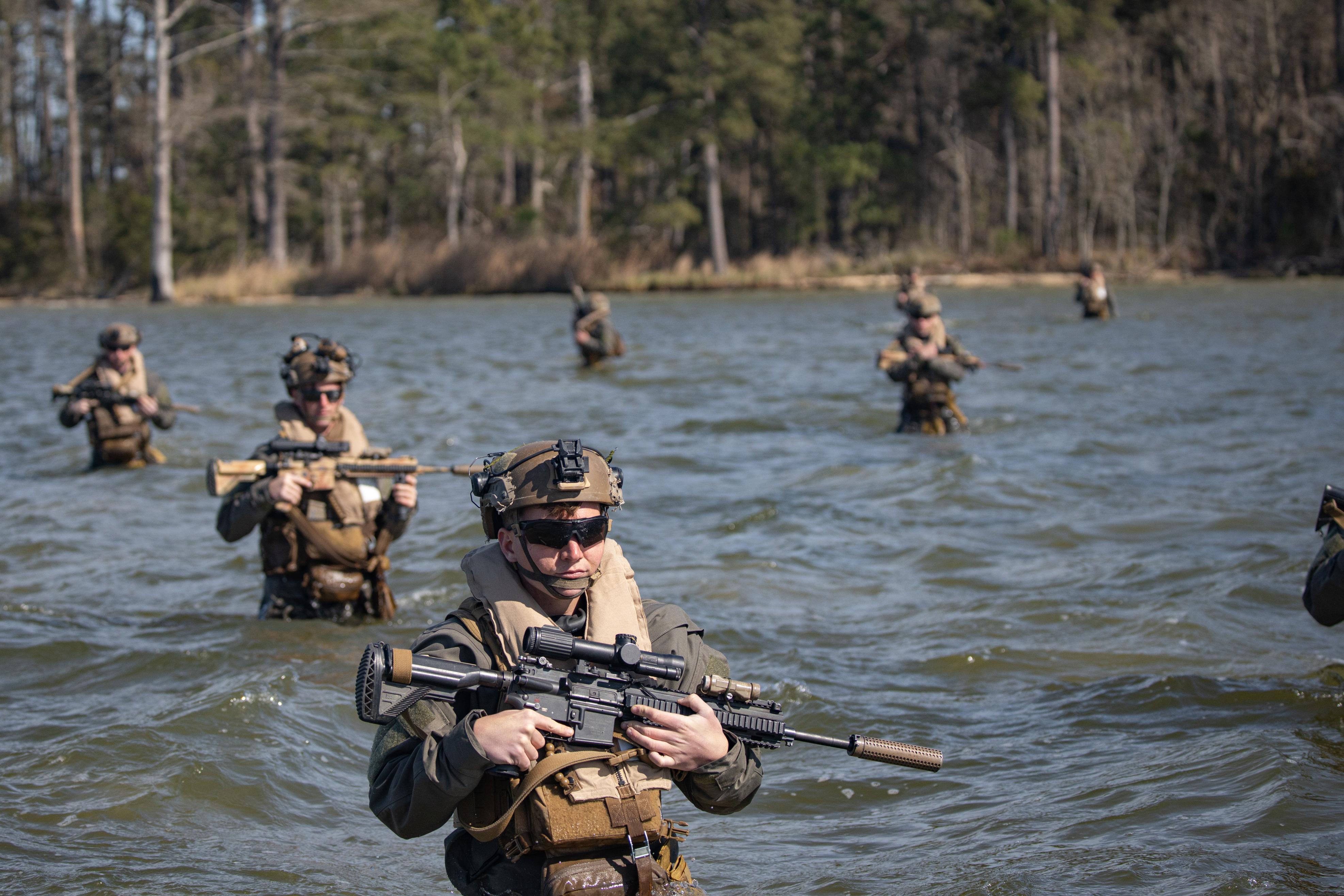 U.S. Marines with Charlie Company, Battalion Landing Team (BLT) 1/6, 26th Marine Expeditionary Unit (MEU) conduct boat patrols during a littoral movement as part of MEU Exercise III on Camp Lejeune, North Carolina, March 11, 2023. BLT 1/6 continues to enhance RHIB familiarization and readiness through conducting on and off and shore-to-shore drills prior to deployment. The 11m RHIBs provide the Marine Air-Ground Task Force Commander a high-speed, long –range, low-signature combatant craft capable of projecting and recovering Marines for a variety of missions. (U.S. Marine Corps photo by Cpl. Aziza Kamuhanda)