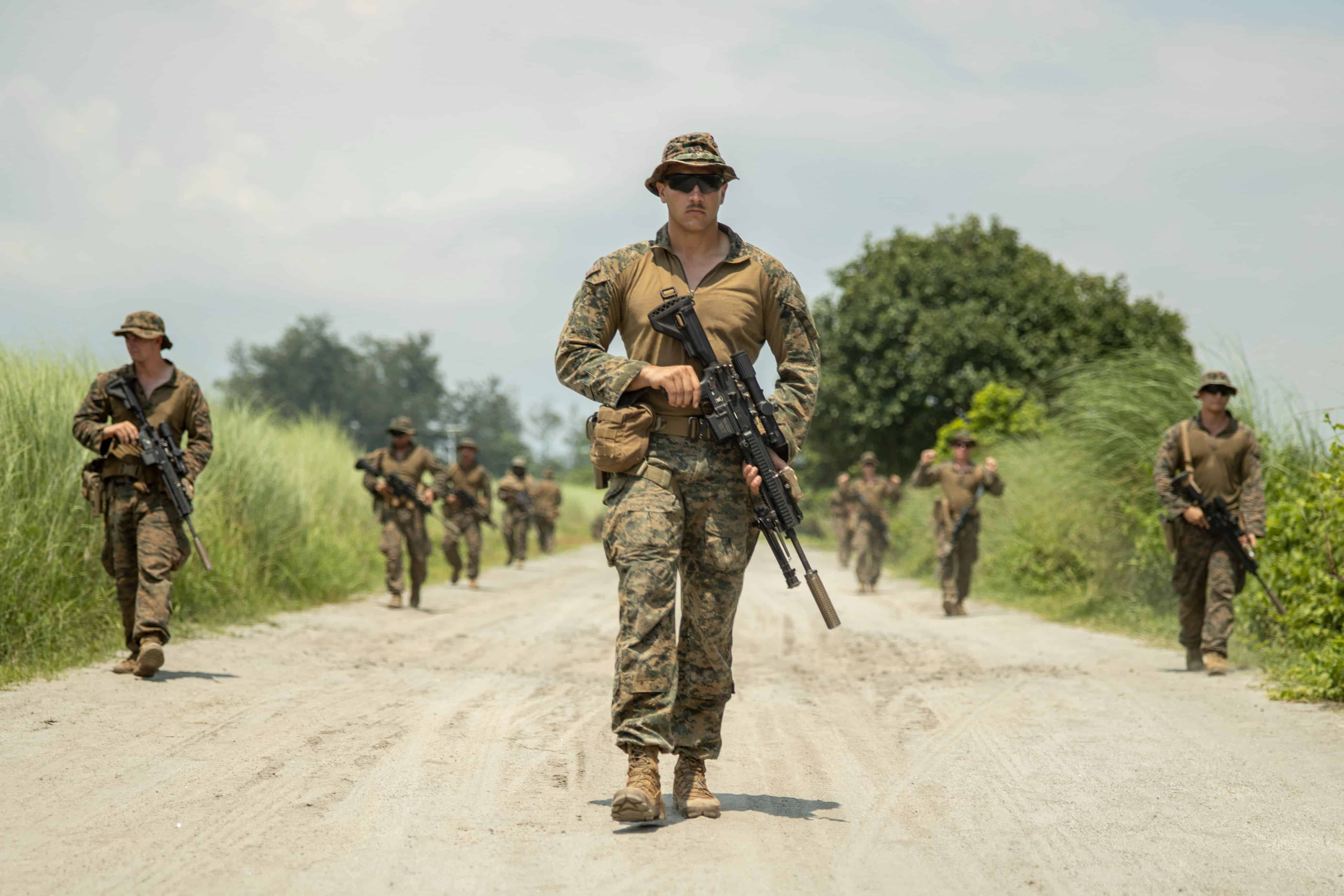 U.S. Marines with 3d Littoral Combat Team, 3d Marine Littoral Regiment, 3d Marine Division, conduct a security patrol during Marine Aviation Support Activity 23 at Naval Education, Training and Doctrine Command, Philippines, July 11, 2023. MASA is a bilateral exercise between the Armed Forces of the Philippines and the U.S. Marine Corps