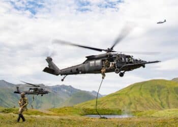 East-Coast-based U.S. Naval Special Warfare Operators (SEALs) fast-rope from U.S. Army MH-60M helicopters, assigned to the 160th Special Operations Aviation Regiment (SOAR), while an AC-130J Ghostrider provides overwatch on Attu Island, Alaska, Aug. 31, 2023