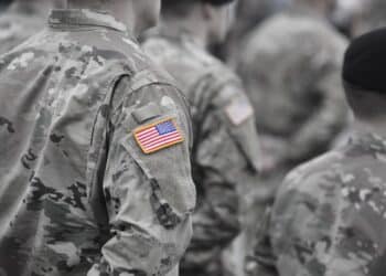 Veterans Day. US soldiers. US army. USA patch flag on the US military uniform. United States Armed Forces.