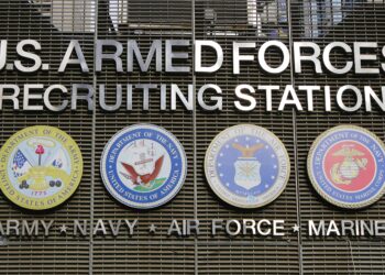 NEW YORK CITY - DECEMBER 18:U.S. Armed Forces Recruiting Station recruits the enlisted, non commissioned and officer candidates for service in the US Armed Forces in Times Square on December 18, 2014